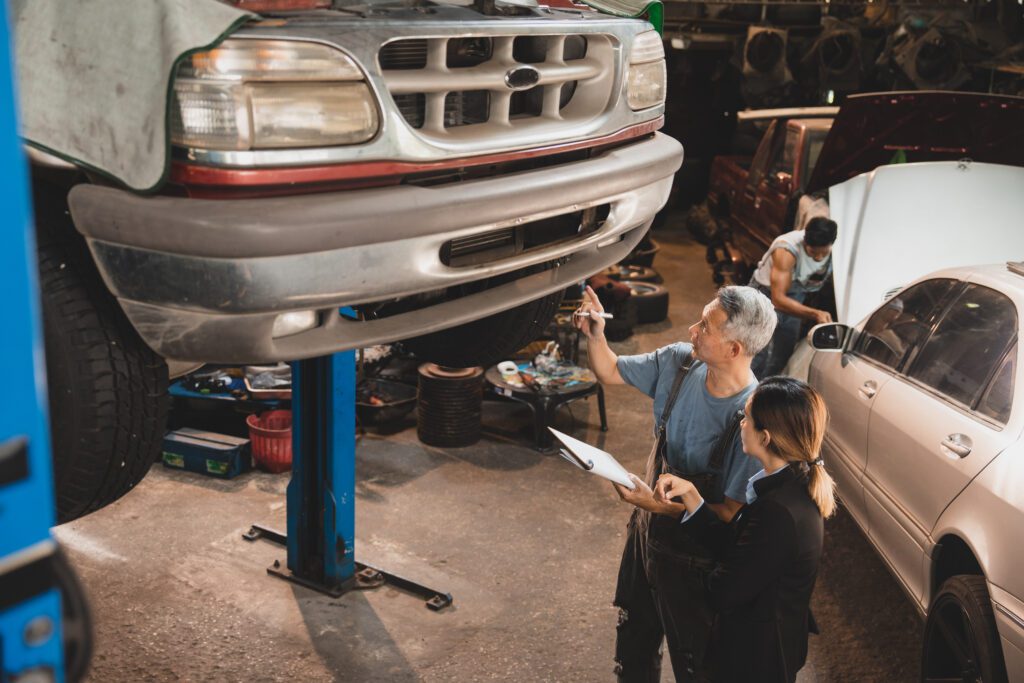 customer making inspection check to a car engine r 2023 11 27 05 05 30 utc The No.1 Best Auto Repair in Irving TX- Carmex INC.
