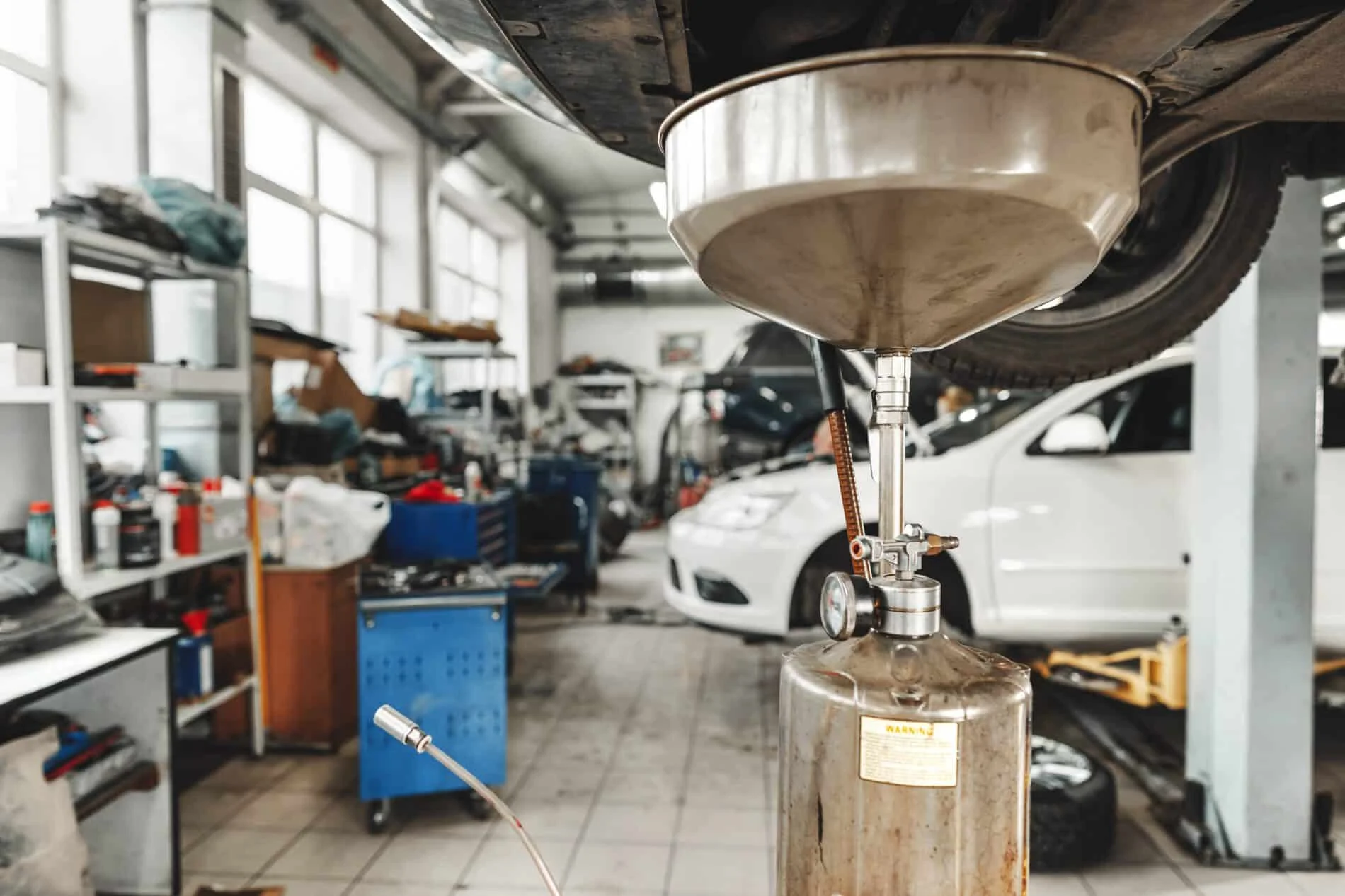 process of oil change in a car service 2023 11 27 04 59 42 utc scaled The No.1 Best Auto Shop in Irving TX- Carmex INC.